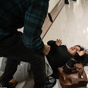 NYC ICE attacks woman.jpeg