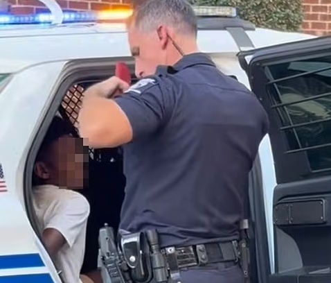 Charlotte NC 12 year old cuffed.jpeg